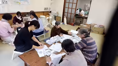 お散歩マーケット2025.11マップ折・景品袋詰-上直竹上分の写真